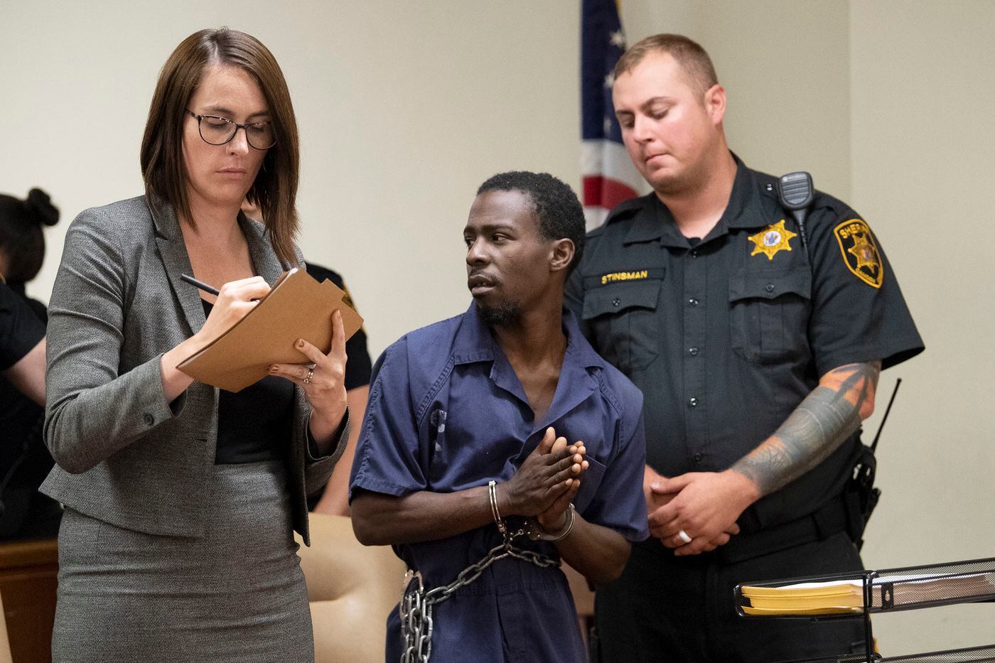 brandon beverly, gestures with his public defender, margaret