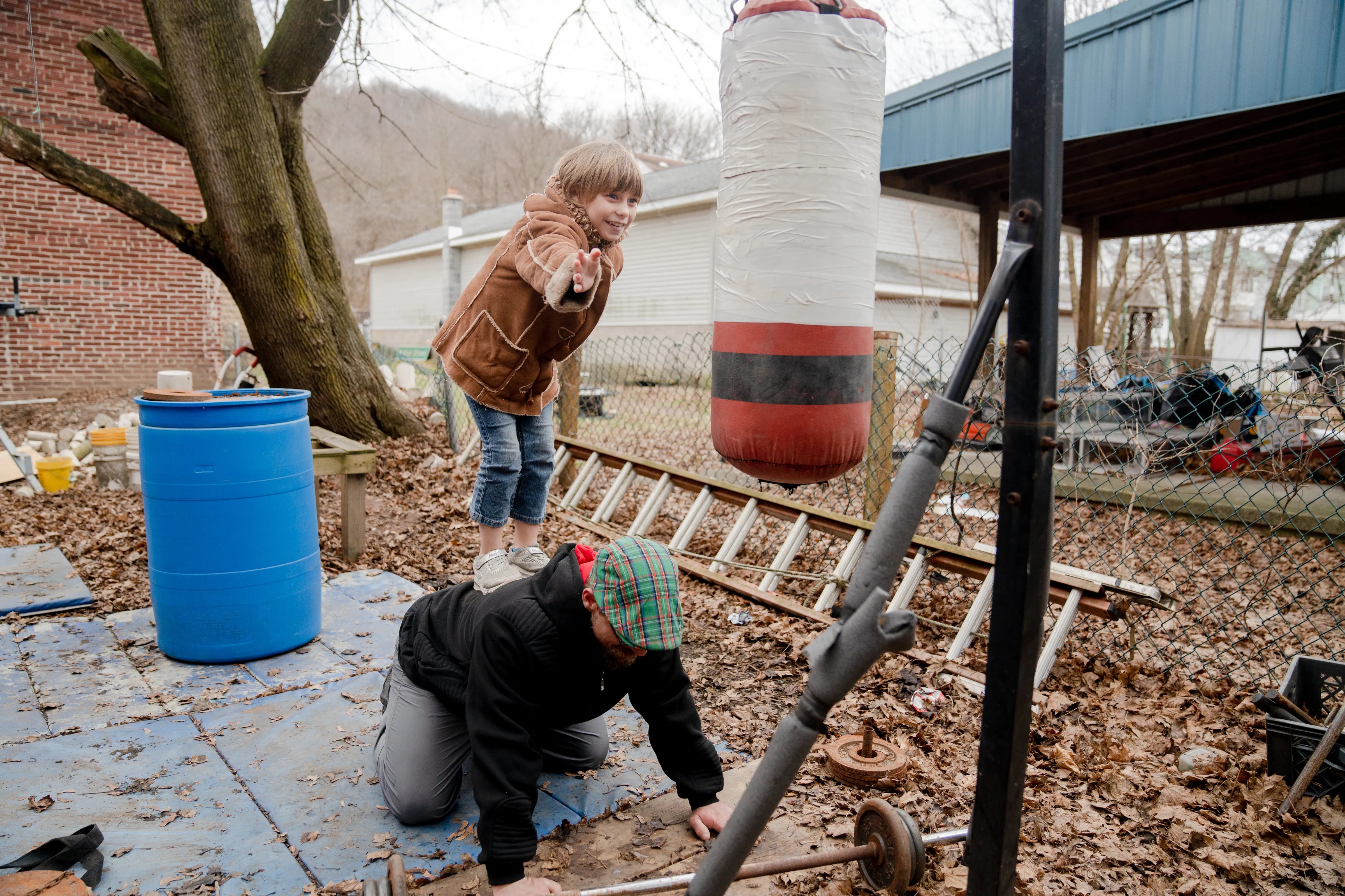 William Dales spends time with his daughter, Cassie, 7, at his home in Shamokin. Dales, a professional slap competitor, is currently training for the heavyweight title fight.