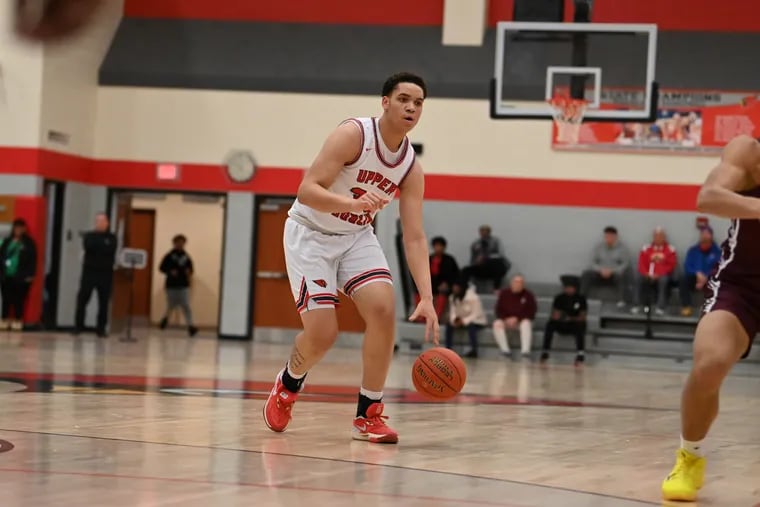 Upper Dublin’s Idris Rines handles the ball against Abington during a game on Jan. 30.