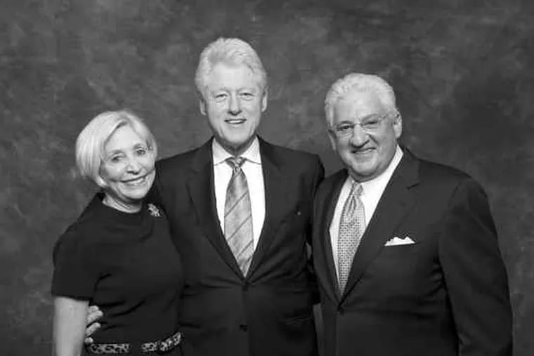 Leonard Barrack, president of the Jewish Federation of Philadelphia, with his wife, Lynne, and former President Bill Clinton, who was the guest speaker. The event drew more than 750 guests and raised $3.5 million.