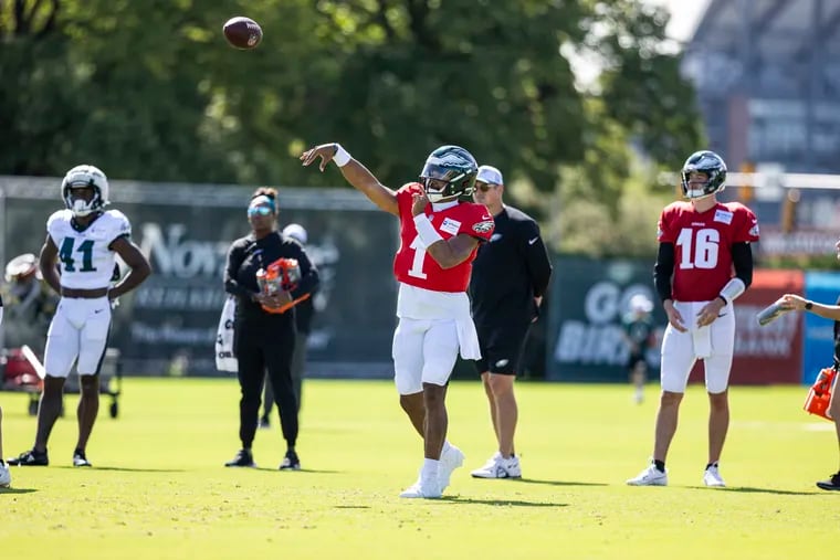 Quarterback Jalen Hurts fires a pass during practice at the NovaCare Complex on Wednesday.