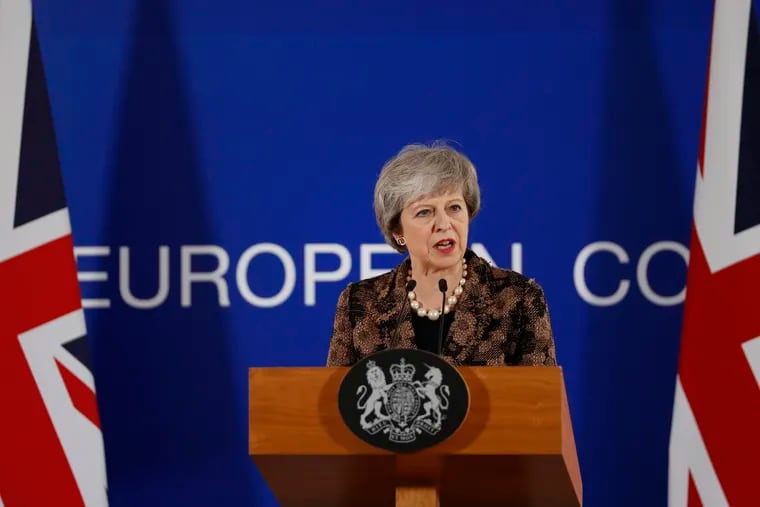 British Prime Minister Theresa May speaks during a media conference at an EU summit in Brussels, Friday, Dec. 14, 2018. European Union leaders expressed deep doubts Friday that British Prime Minister Theresa May can live up to her side of their Brexit agreement and they vowed to step up preparations for a potentially-catastrophic no-deal scenario. (AP Photo/Alastair Grant)