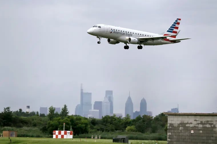 An American Eagle plane lands at Philadelphia International Airport on July 18, 2019.