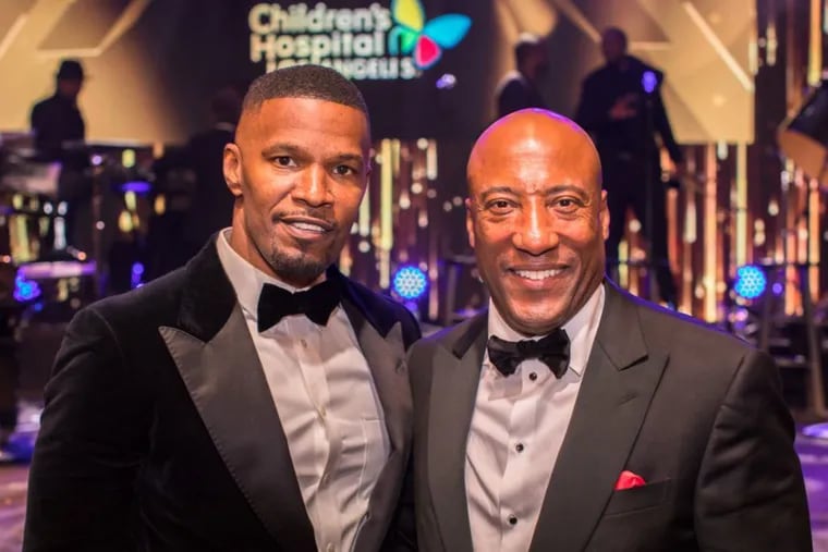 Actor and singer Jamie Foxx with Byron Allen at the Oscar Gala in February.