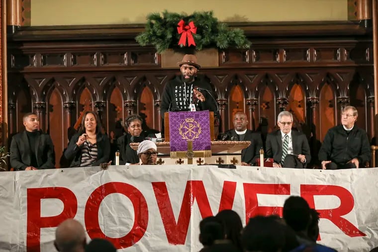 Philadelphia Eagles safety Malcolm Jenkins speaks to dozens of attendees at a rally at Arch Street United Methodist Church on Monday, Dec. 16, 2019, demanding transparency and accountability in the selection of the next police commissioner and the police contract process.