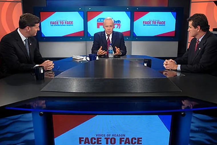 Larry Kane (center) goes over ground rules before the taping of debate last month between Democratic U.S. Rep. Patrick Murphy (left) and Mike Fitzpatrick (right), Murphy's Republican opponent in the 8th Congressional District election. (Tom Gralish / Staff Photographer)