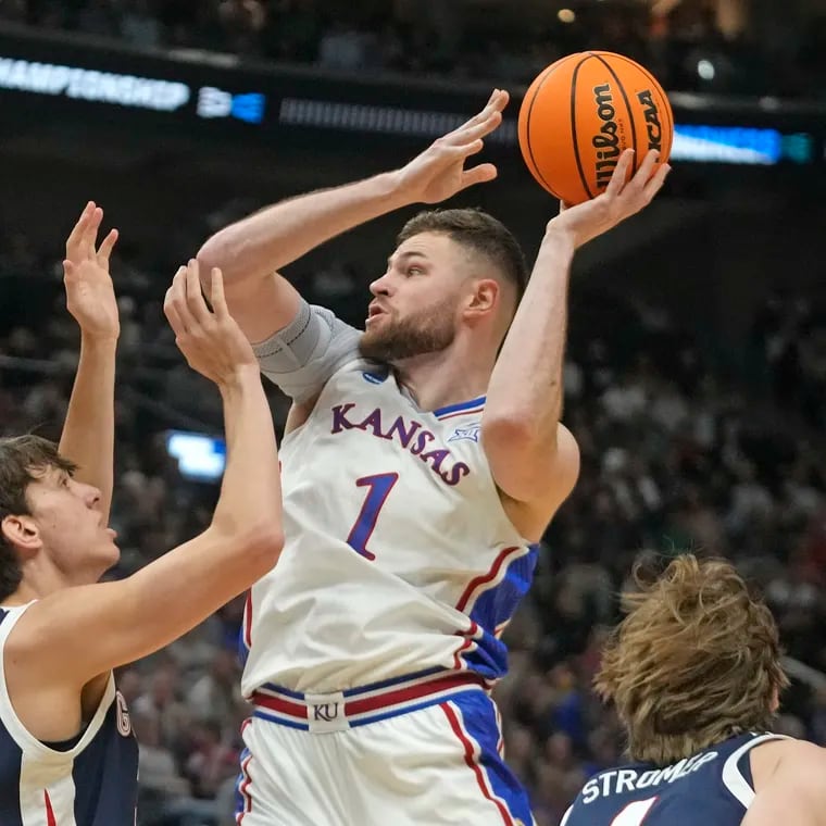 Kansas center Hunter Dickinson shoots as Gonzaga forward Braden Huff guards him during an NCAA Tournament on March 23.