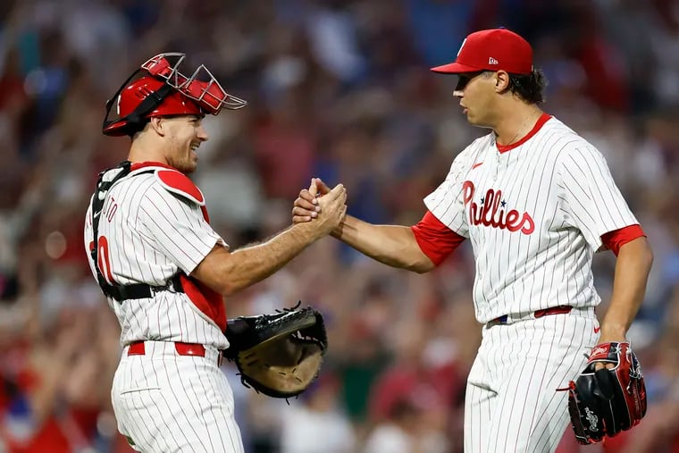 South Jersey native Tyler Phillips, right, is back in the majors with the Phillies and will start Tuesday night in Toronto.