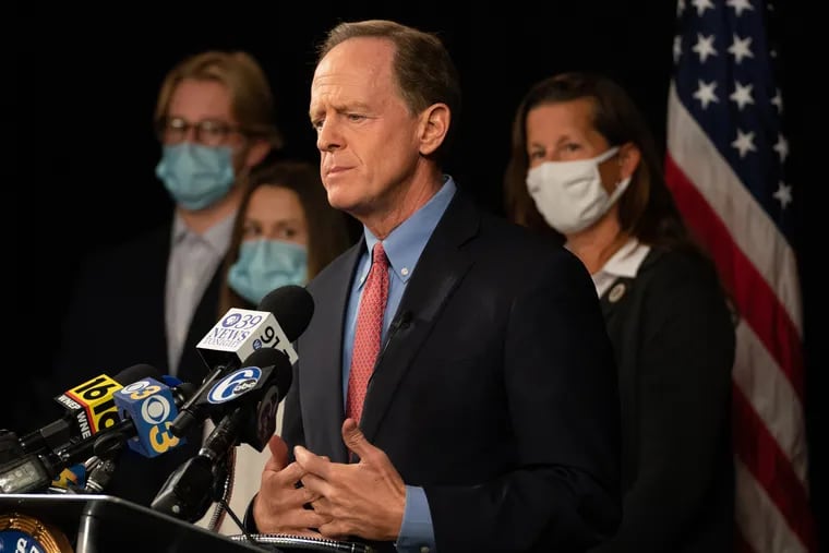 U.S. Senator Pat Toomey (R-Pa.) speaks during a press conference with his family in October.