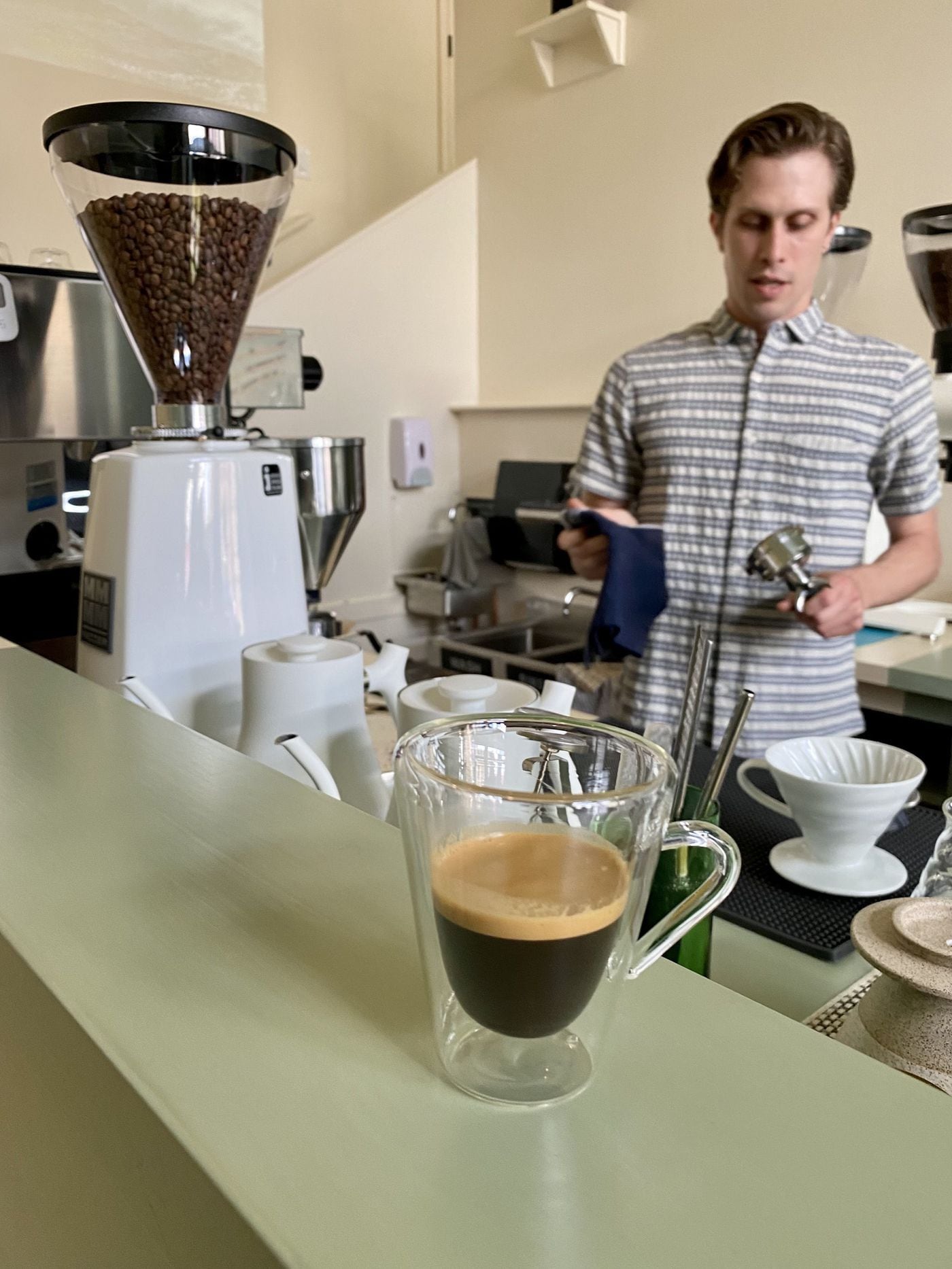 Kyle Horne makes a coffee drink at Forin Cafe.