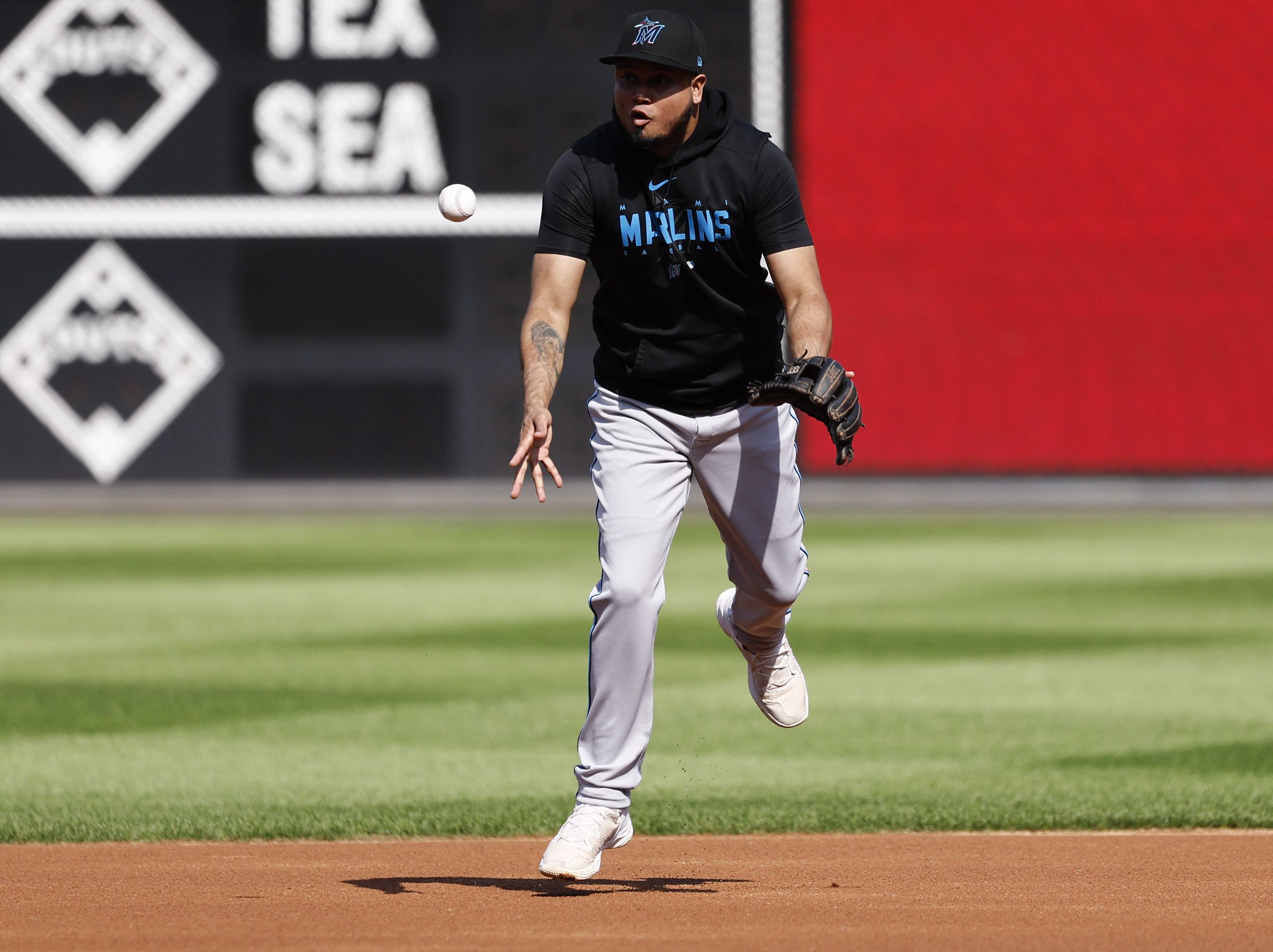 Jacob Stallings and Sandy Alcantara of the Miami Marlins shake