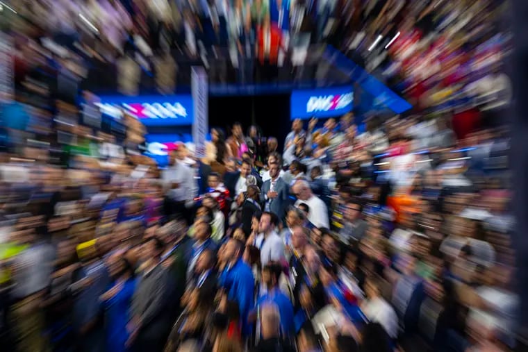 Democrats stand for the Pledge of Allegiance on Tuesday at the Democratic National Convention in Chicago.