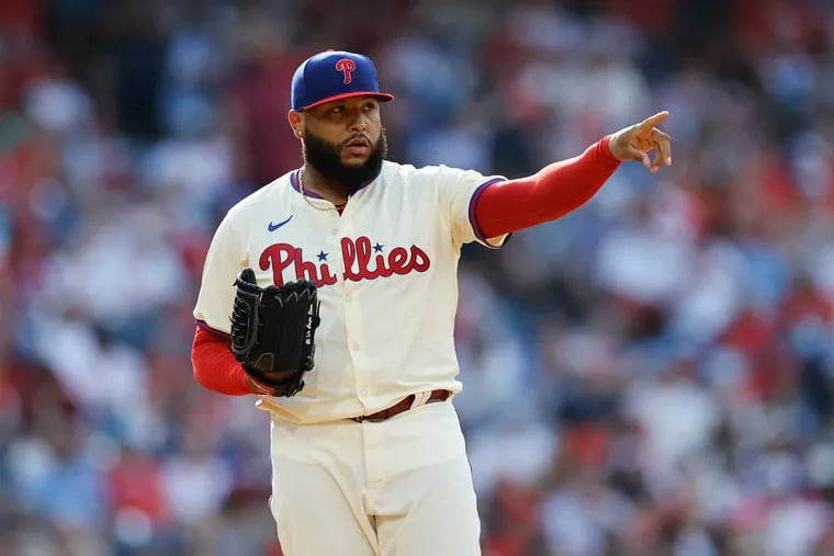 Phillies pitcher José Alvarado points against the Miami Marlins on June 29.