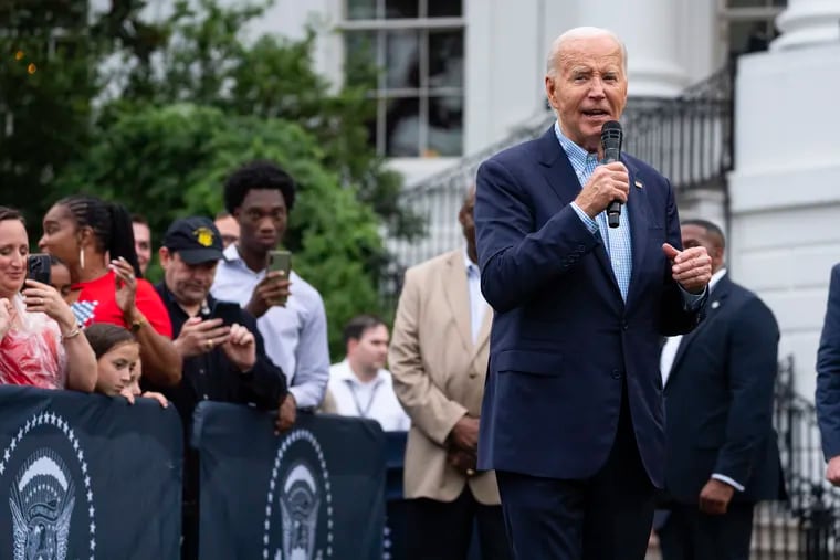 President Joe Biden speaks during a barbecue with active-duty military service members and their families on the South Lawn of the White House on Thursday.