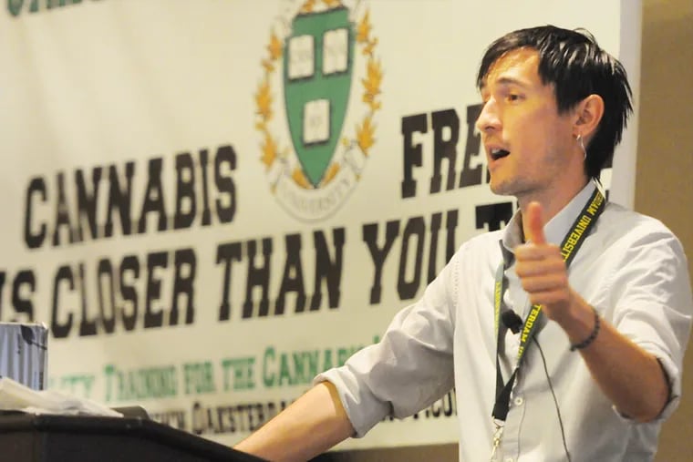 Horticulture instructor Joey  Ereneta talks to attendees of the marijuana conference at Bally's in Atlantic City, NJ on Sunday, August 24, 2014.