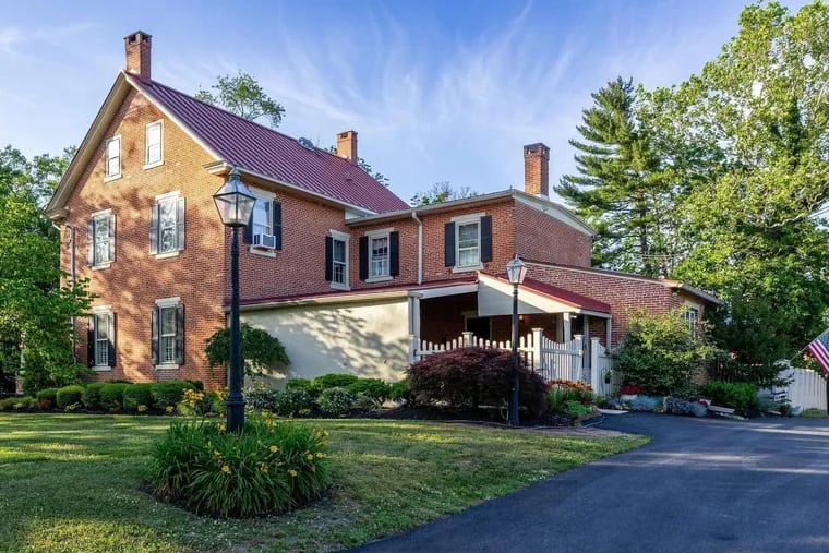 The Federal-style home was built in 1865.