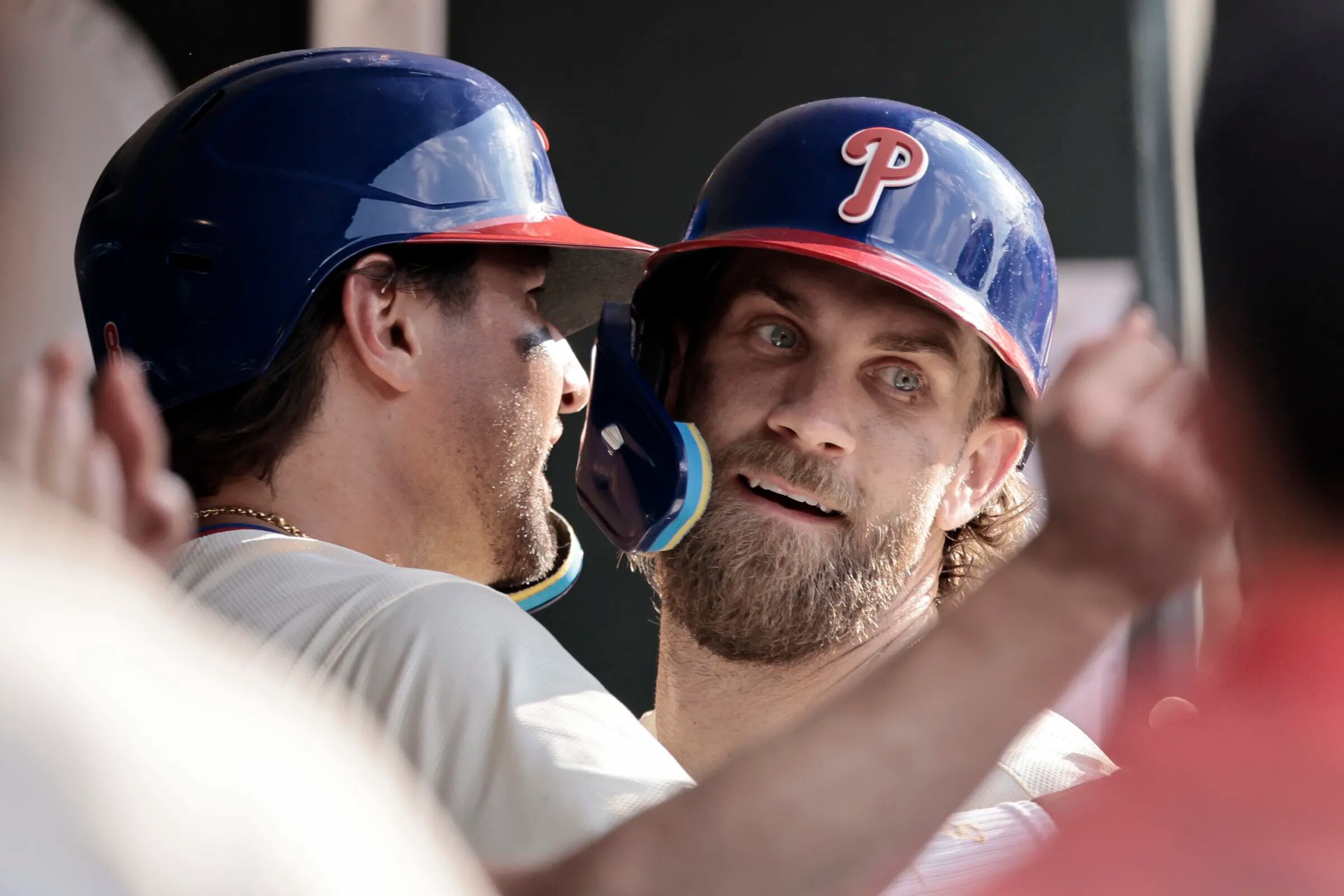 Phillies Bryce Harper is hugged by Nick Castellanos after Harper hit his 21st homer of the year in the seventh inning of the Oakland Athletics vs. Philadelphia Phillies MLB game at Citizens Bank Park in Philadelphia on Saturday, July 13, 2024.