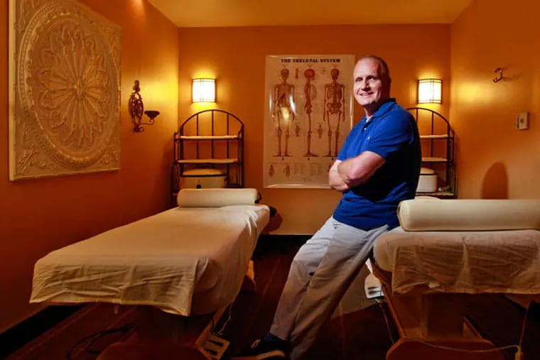 Richard Keaveney on the third floor of Toppers Spa/Salon in Center City, where the massage school will be. (MICHAEL BRYANT/Staff Photographer)