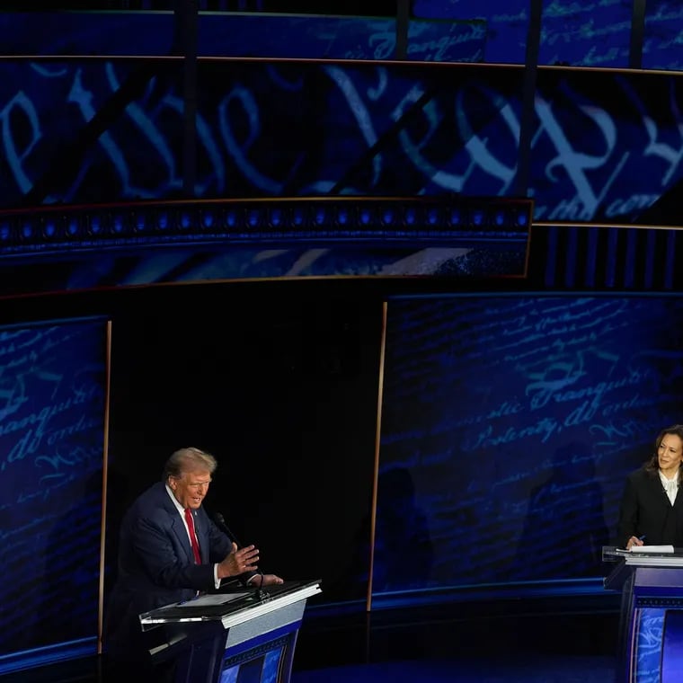 Donald Trump and Vice President Kamala Harris debate Tuesday in Philadelphia. (MUST CREDIT: Demetrius Freeman/The Washington Post)