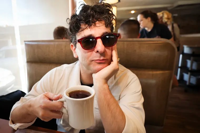 Adam Weiner of Low Cut Connie poses for a portrait at the Penrose Diner in South Philadelphia on Saturday, Sept. 16, 2023.