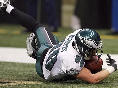 Philadelphia Eagles Kevin Curtis celebrates his touchdown on a 61-yard pass  in the first half of the football game with the Detroit Lions Sunday, Sept.  23, 2007, in Philadelphia. The Eagles are