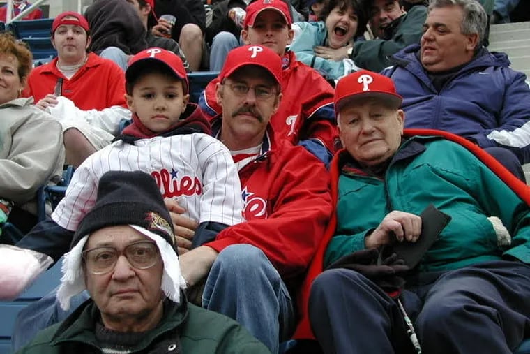 Tyler Phillips, his father Dan, and his grandfather Frank at the Veterans Stadium finale in 2003.