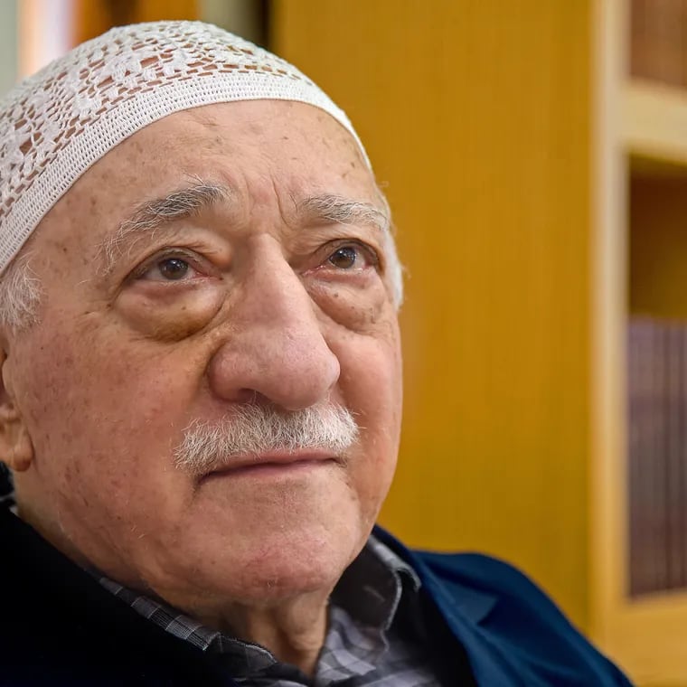 Fethullah Gülen sits among his guests during an afternoon prayer at his property in Saylorsburg, Pa., in 2019.