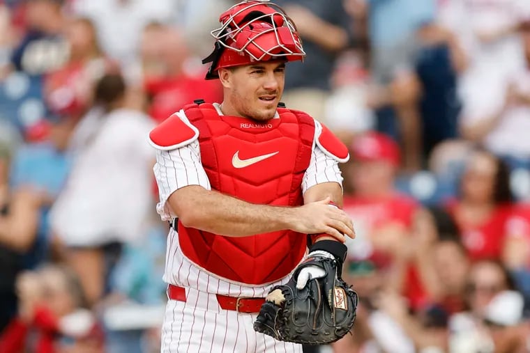 Phillies catcher J.T. Realmuto is expected to miss a few days after fouling a ball off his left knee Friday night.