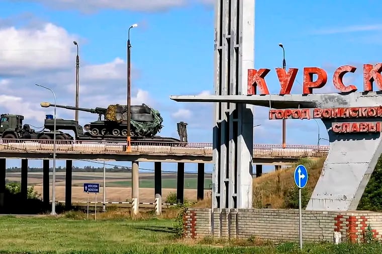 A column of the Russian Armed Forces move to build up forces conducting active combat operations with Ukrainian formations in the Sudzhansky district of Kursk region of Russia on Friday, Aug. 9, 2024.