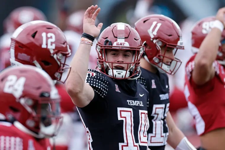 Temple quarterback Tyler Douglas is flanked by Evan Simon (No. 12) and Forrest Brock (No. 11) during spring practice.