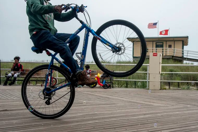 August 9, 2021: Lill Hayes does a wheelie along the Boardwalk in Atlantic City.