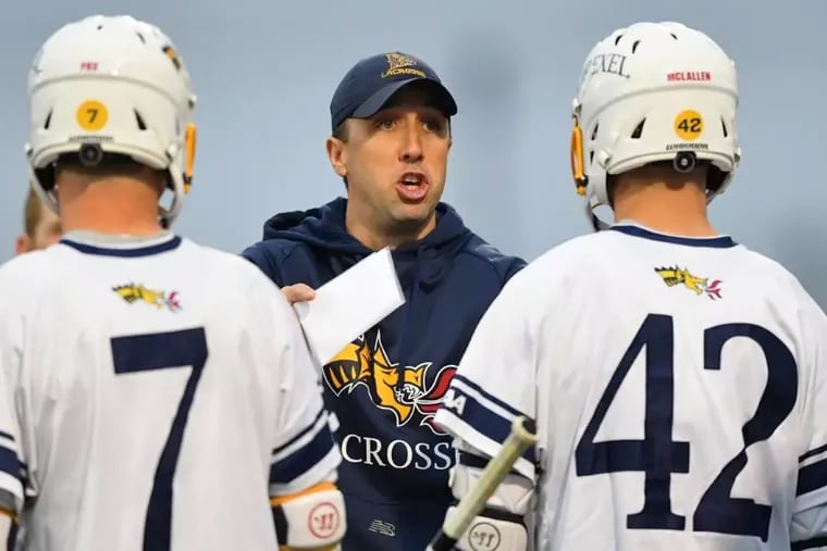 Steve Boyle (center) is the new men's lacrosse coach at Drexel after spending 10 seasons as an assistant.