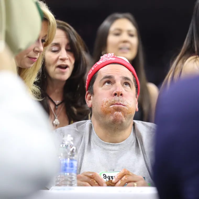 Eaters compete during the second round of Wing Bowl 25 at the Wells Fargo Center in 2017.