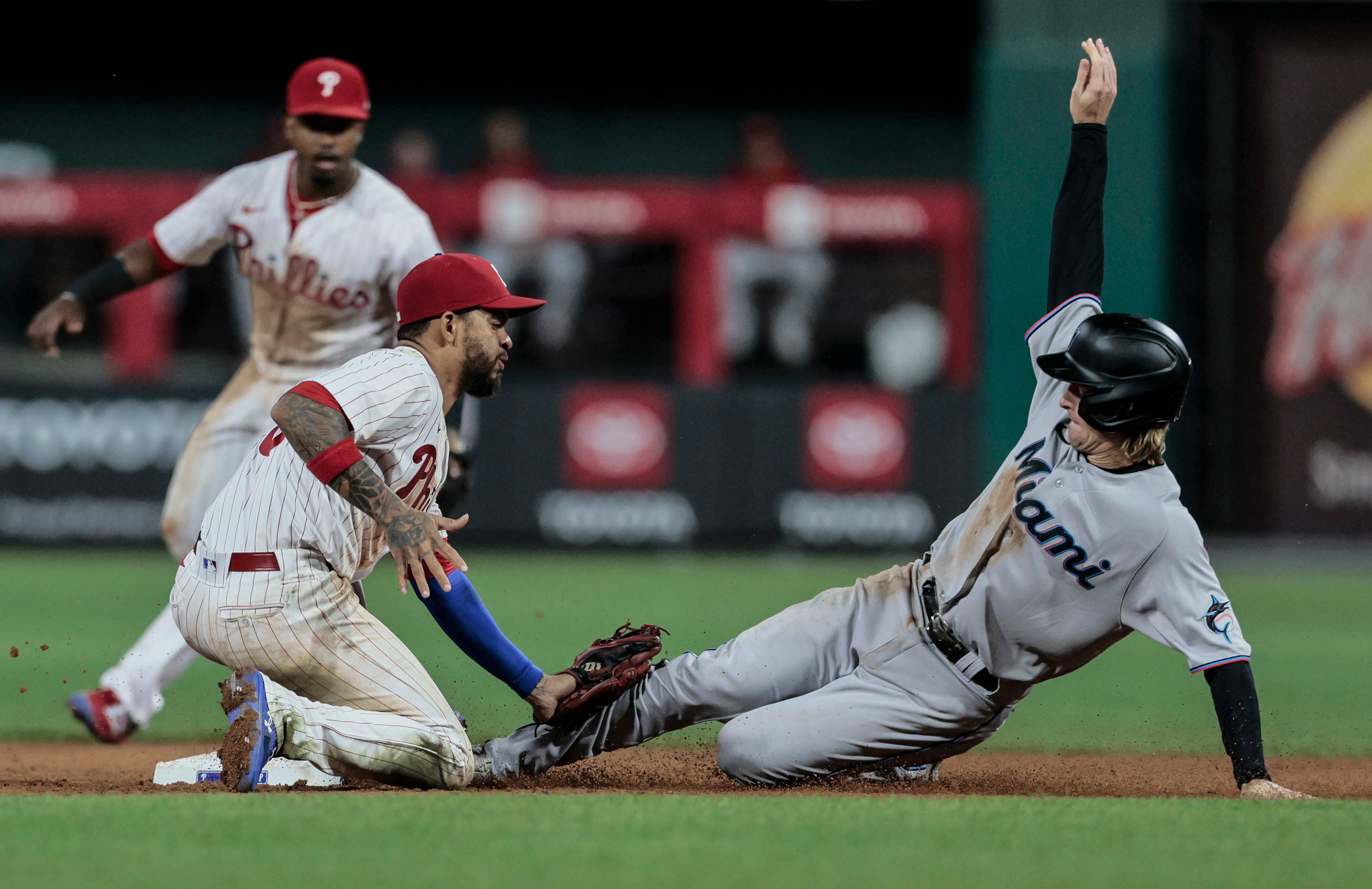 Philadelphia Phillies' Edmundo Sosa gestures from second base