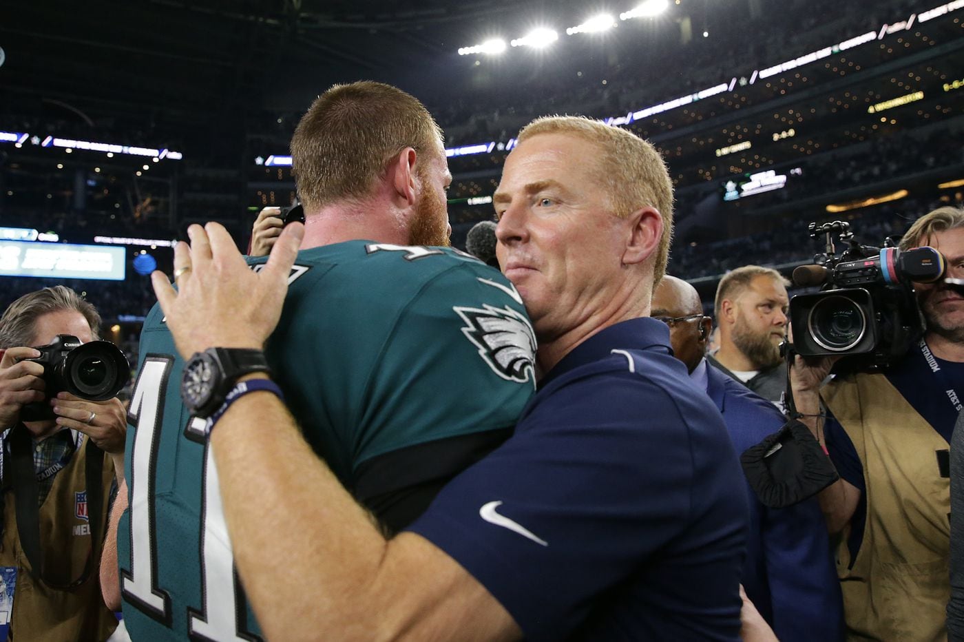 jason garrett hugs carson wentz after his cowboys destroyed