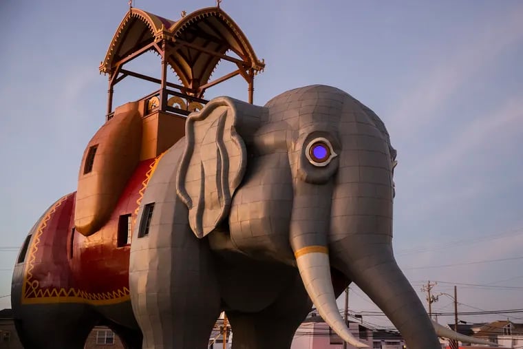 Lucy the Elephant is shown at dusk.  Lucy was officially unveiled after dark in Margate, N.J.  after a $2.4 million renovation on Dec. 28, 2022.