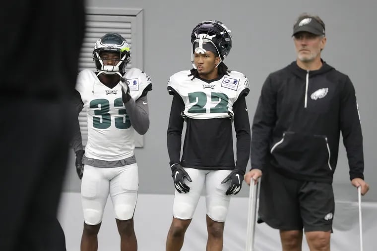 Eagles cornerback Sidney Jones, center, waits to start a drill during practice at the NovaCare Complex.