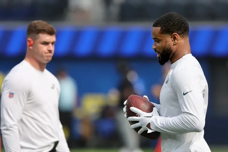 Philadelphia Eagles cornerback Darius Slay (right) warms up before they play the Rams at SoFi Stadium in Inglewood, Calif. on Sunday, Oct. 8, 2023.