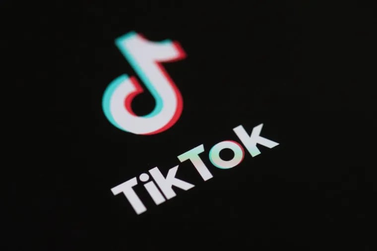 This illustration picture taken on May 27, 2020, in Paris shows the logo of the social network application TikTok on the screen of a phone. Middle schoolers in Great Valley School District created more than 20 TikTok accounts impersonating teachers.