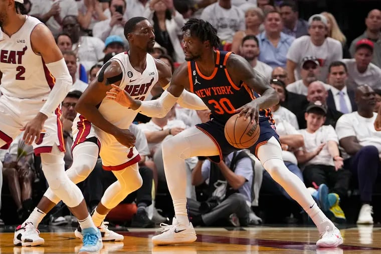 Julius Randle of the New York Knicks posts up Bam Adebayo  of the Miami Heat during game three of the Eastern Conference Semifinals at Kaseya Center on May 06, 2023 in Miami, Florida. (Photo by Eric Espada/Getty Images)