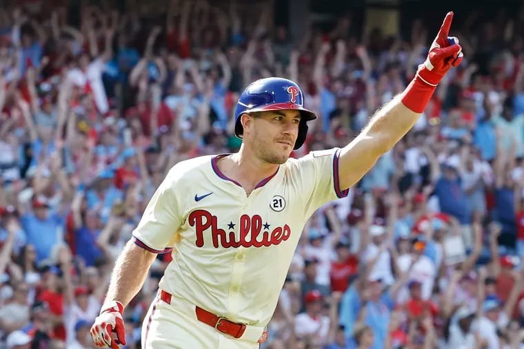 Phillies J.T. Realmuto celebrates after hitting the game-winning walk off RBI single.