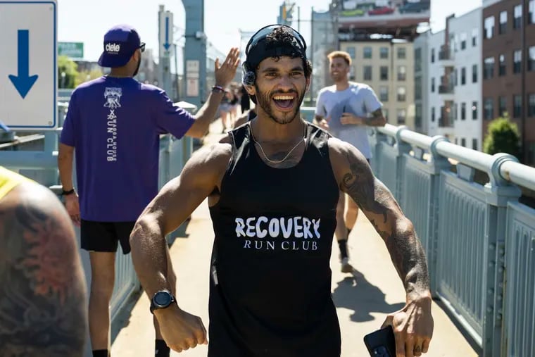 Kellen Matthews, founder of Recovery Run Club, finishes up a run with attendees on Saturday, June 15, 2024 in Philadelphia.