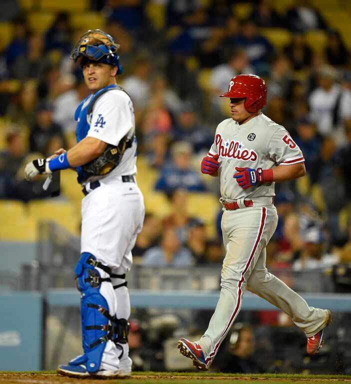 Cliff Lee, Carlos Ruiz dominant as Dodgers fall in opener to