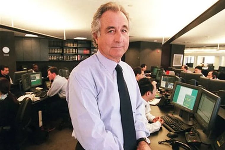 Bernard L. Madoff, chairman of Madoff Investment Securities, is seen on his Manhattan trading floor in this photo taken in 1999 in New York. (AP Photo/The New York Times, Ruby Washington)