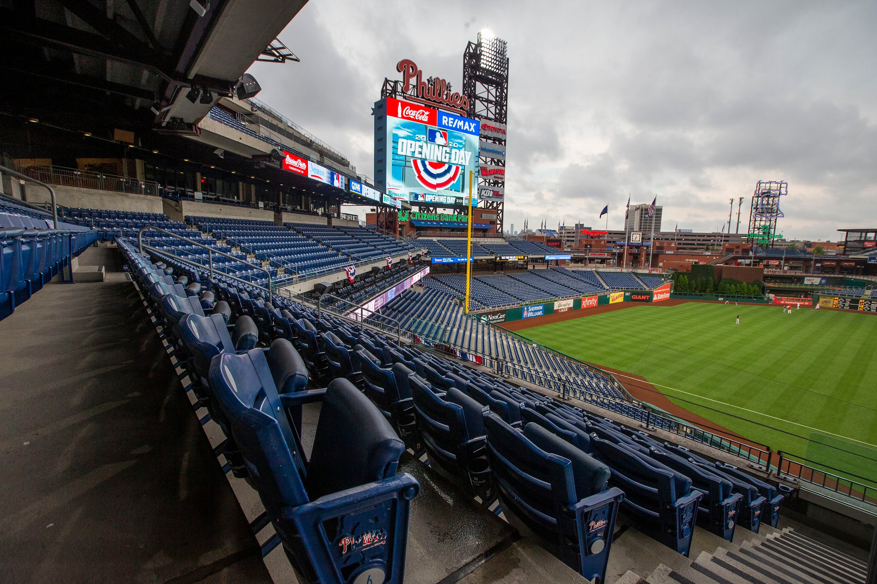 Aguilar leads Marlins over Phillies 5-2 in Girardi's debut