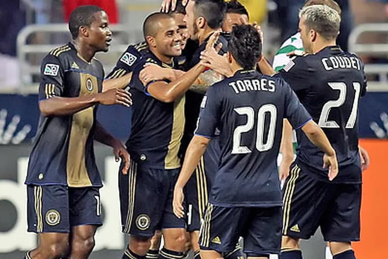 Eduardo Coudet (right) got his first game action for the Union during the first half. (Steven M. Falk/Staff Photographer)