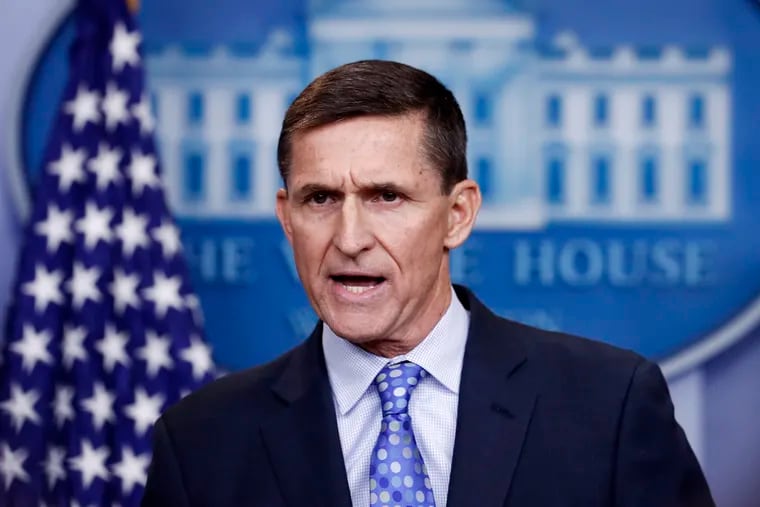 FILE - In this Feb. 1, 2017 file photo, National Security Adviser Michael Flynn speaks during the daily news briefing at the White House, in Washington. The Justice Department says it will not oppose probation for former Trump administration national security adviser Michael Flynn.