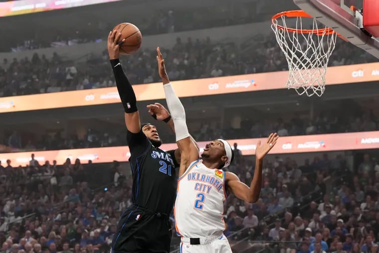 Daniel Gafford #21 of the Dallas Mavericks makes a move to the basket in front of Shai Gilgeous-Alexander #2 of the Oklahoma City Thunder during the first half of Game Six of the Western Conference Second Round Playoffs at American Airlines Center on May 18, 2024 in Dallas, Texas. (Photo by Sam Hodde/Getty Images)