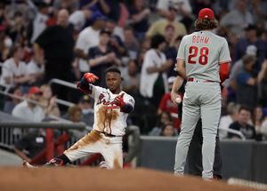 Phillies turn tables on Braves with ninth-inning rally