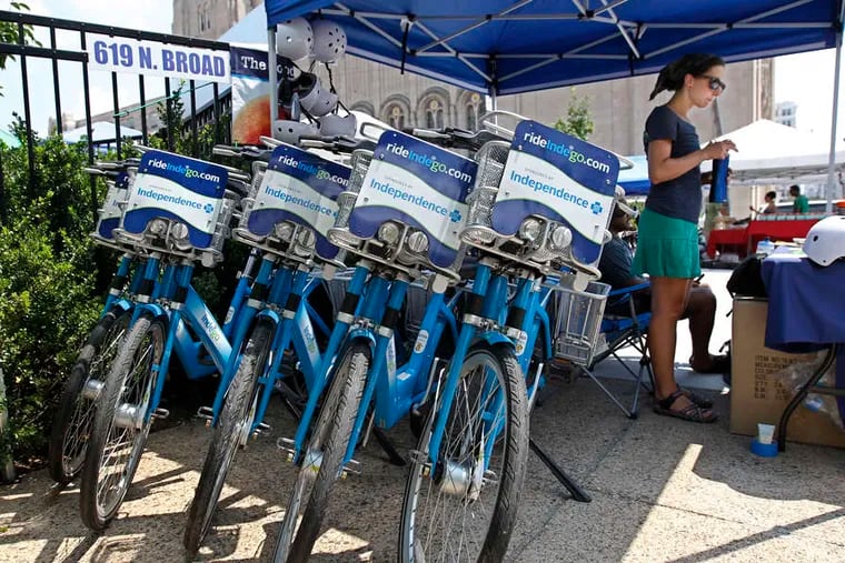 Indego bikes stand ready to be used on tours offered by the Bicycle Coalition at the farmers' market in North Philadelphia.